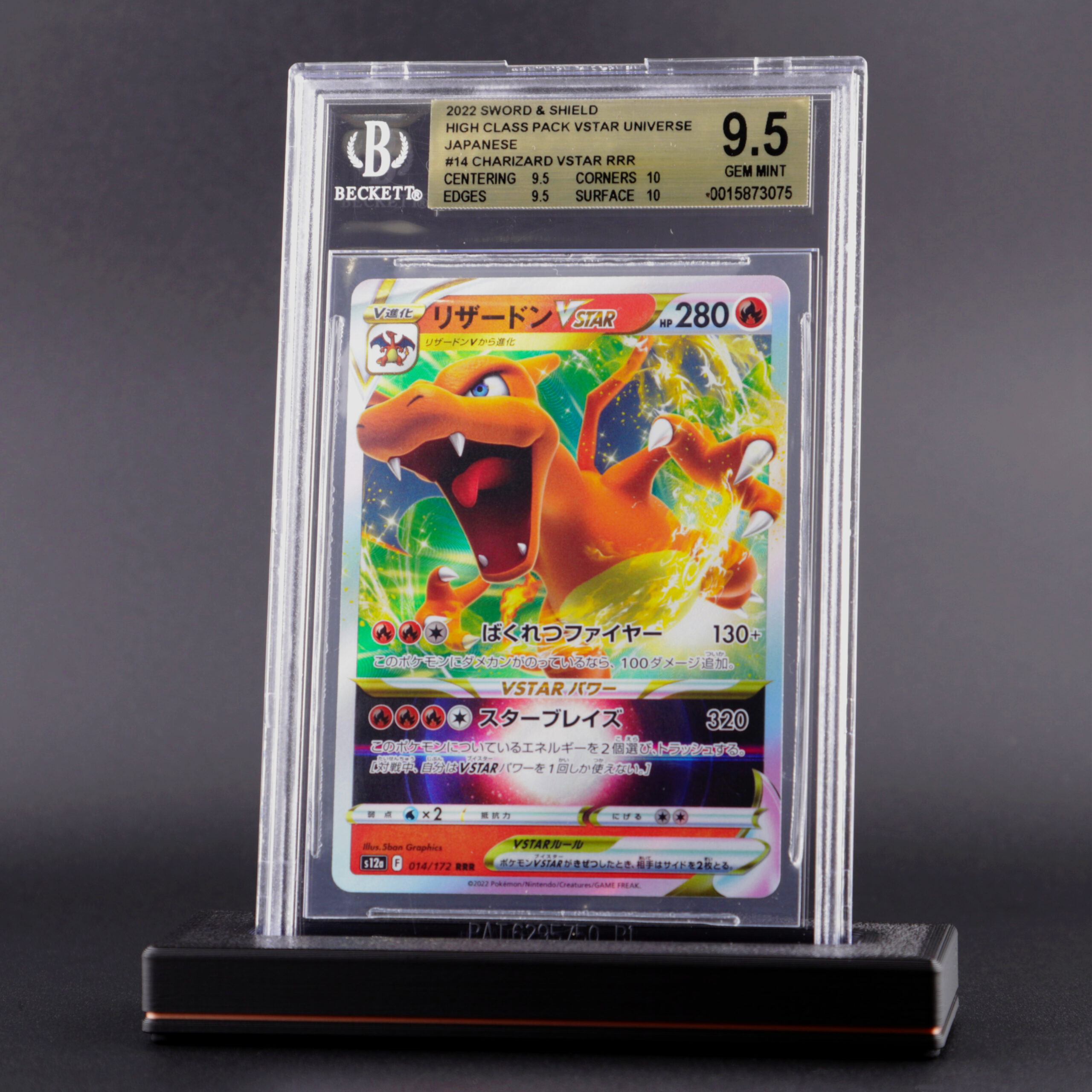 Graded card slab stand holding a BGS graded Pokémon card