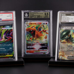 Group shot of graded card slab stands holding PSA, CGC and BGS graded Pokémon cards